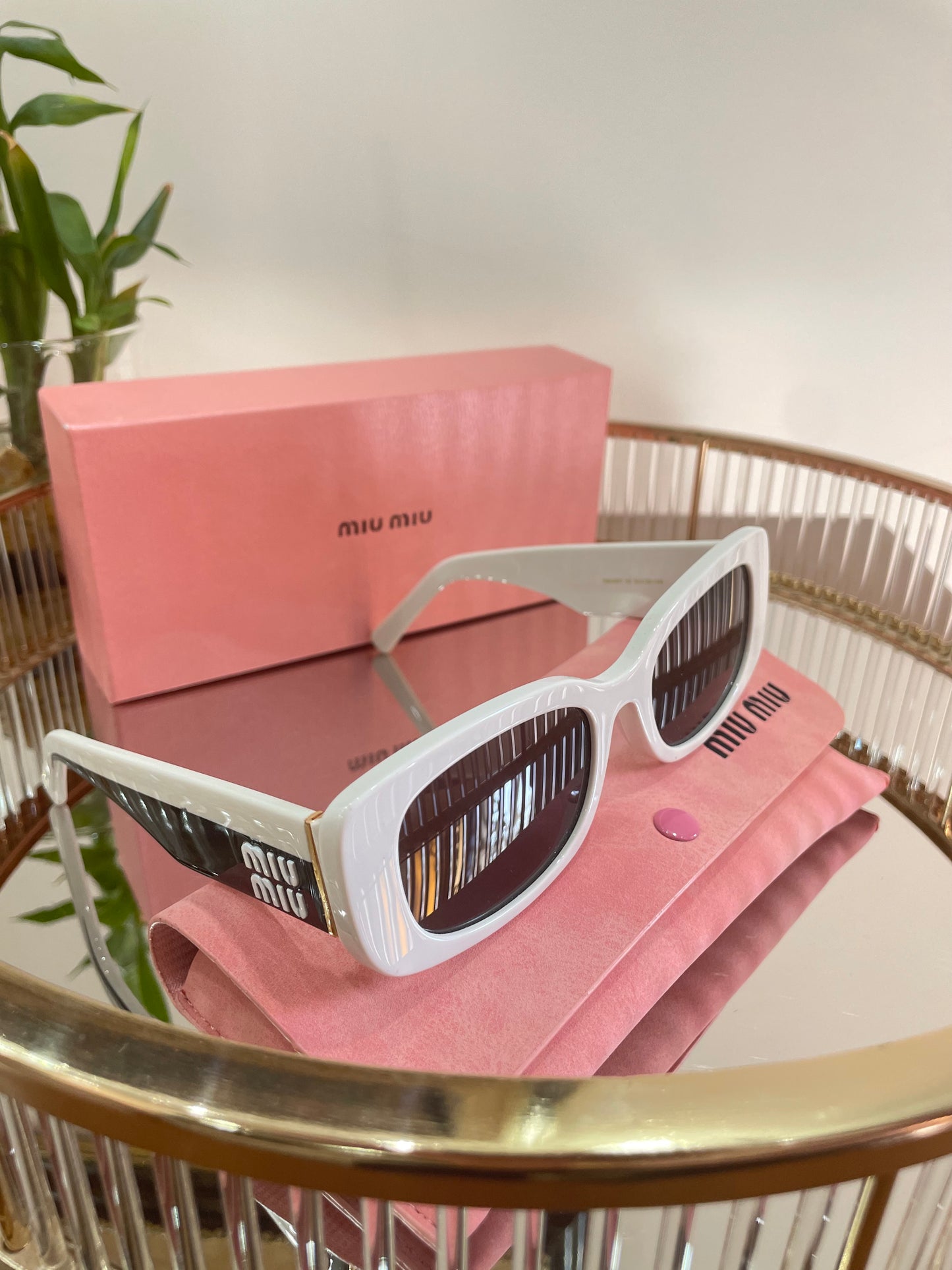 Women sunglasses Miu Miu